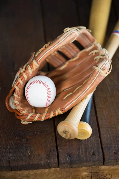 baseball glove, ball and bat