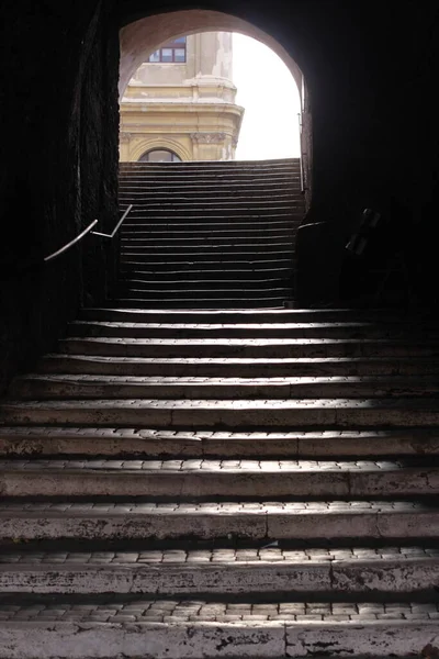 stone stairs. the light at the end of the tunnel