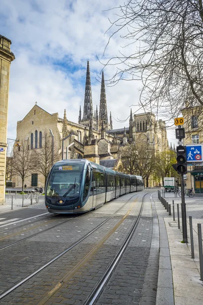 Tram rolling near Cathedral of St. Andre in Bordeaux, France — Stock Photo, Image