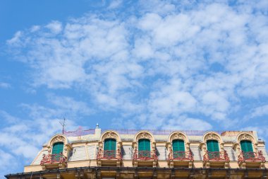 Windows of a attics roof in a european classic building.