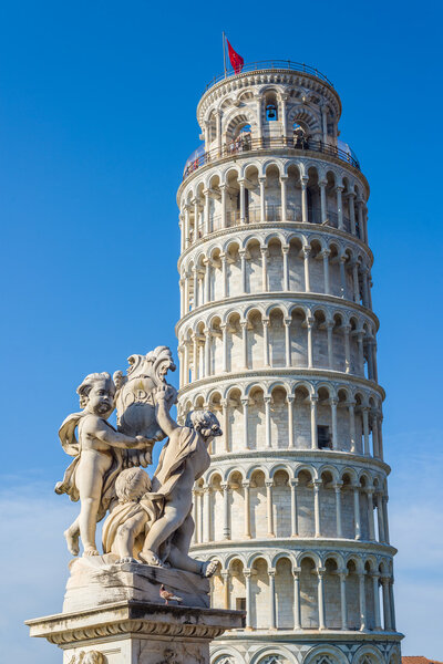 Fontana dei Putti with leaning tower in background. Pisa, Italy