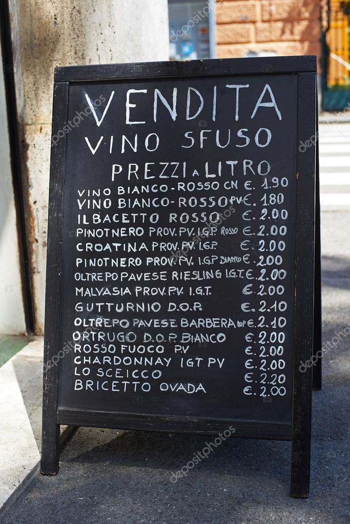 Wines price list on a chalkboard in Genova, Italy Stock Editorial