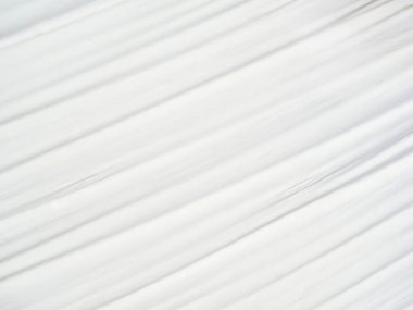 Beyaz buruşuk kumaş doku arkaplanı.