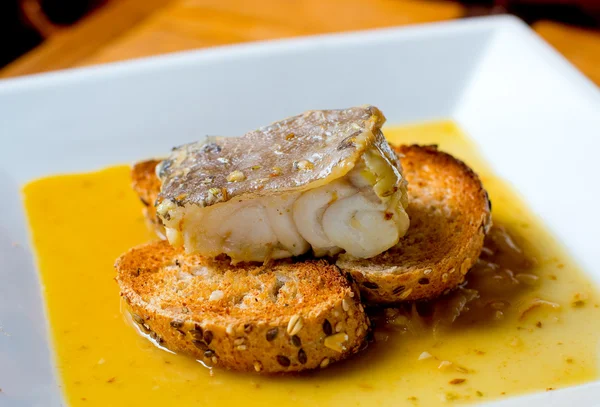 Typical spanish codfish tapa. — Stock Photo, Image