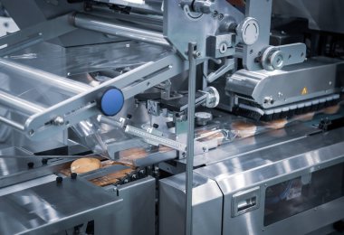 Otomatik paket fırın ürünü yastık ambalajlama makinesi. Ekmek, tost, çörek plastik paketleme makinesi fırın üretim hattında