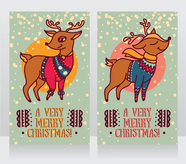 Cartes de vœux pour Noël avec des cerfs mignons en chandails — Image vectorielle