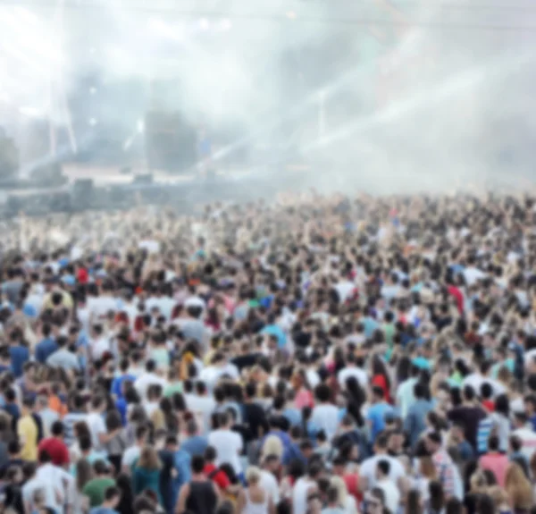 Blurred crowd of people partying — Stock Photo, Image