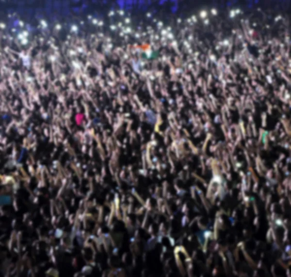 Blurred crowd of people partying — Stock Photo, Image