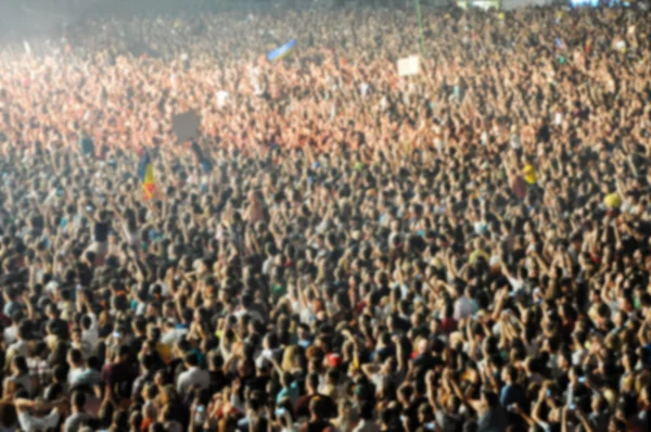 Blurred crowd of people partying — Stock Photo, Image