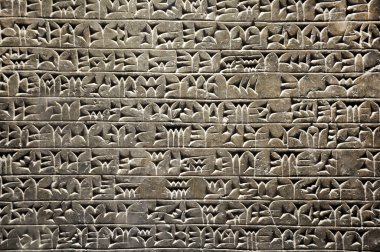 Antik Sümer veya Asur civilizati çivi yazısı yazma