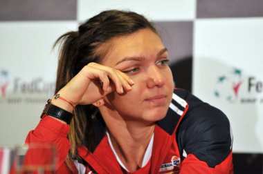 Romanian tennis player Simona Halep during a press conference clipart