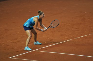 Tenis oyuncusu Irina Begu bir maçtan önce eğitim
