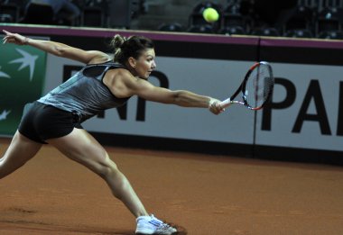 Tenis oyuncu Simona Halep eğitim bir maçtan önce