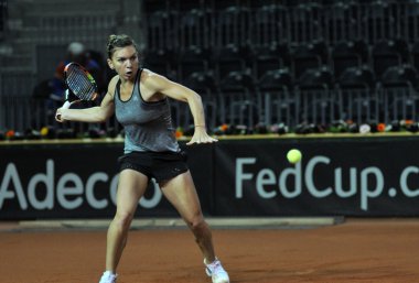 Tenis oyuncu Simona Halep eğitim bir maçtan önce