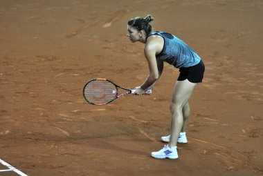 Tenis oyuncu Simona Halep eğitim bir maçtan önce