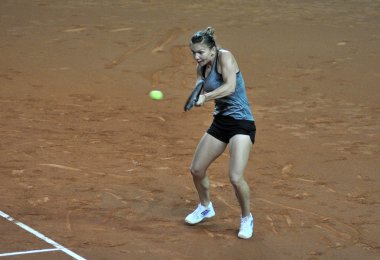 Tenis oyuncu Simona Halep eğitim bir maçtan önce