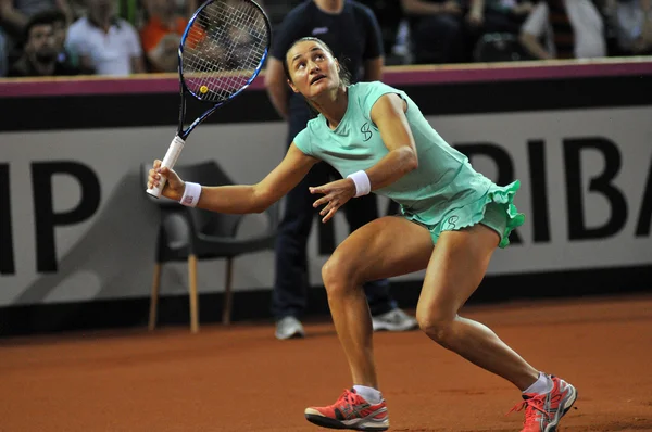 Tenniswoman em ação — Fotografia de Stock