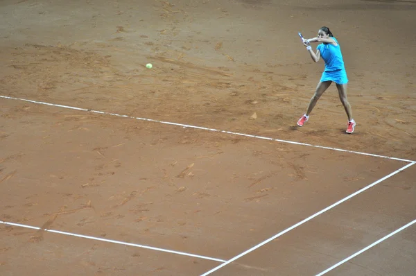 Tenniswoman em ação — Fotografia de Stock