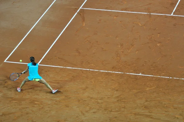 Tenniswoman em ação — Fotografia de Stock