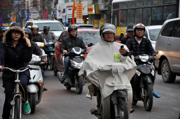 Traffic in Hanoi. Crowd of motorbike drivers on the street — Stock Photo, Image