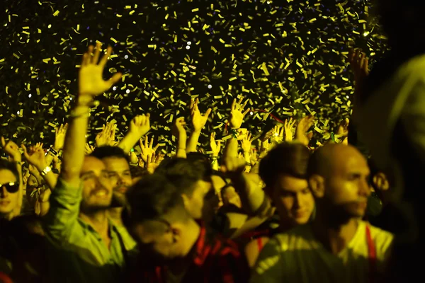 Crowd with raised arms at a live concert — Stock Photo, Image