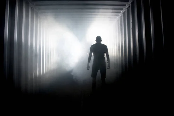Silhouette Man Dark Hazy Underground Corridor Light End Tunnel — Stockfoto