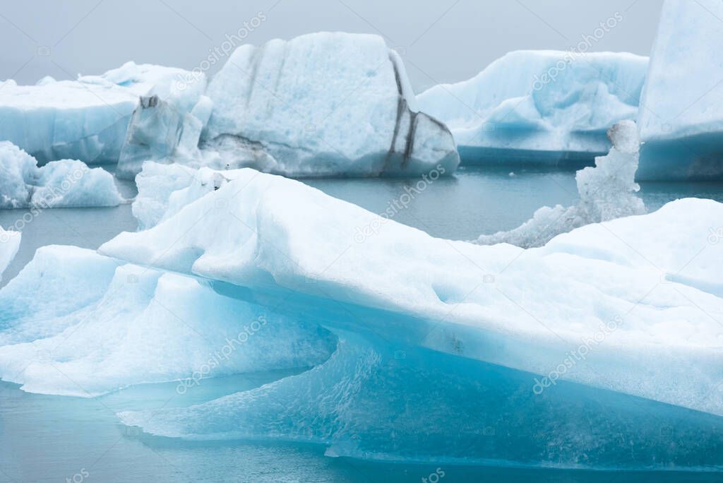 Melting icebergs as a result of global warming and climate change floating in Jokulsarlon glacial lagoon. Vatnajokull National Park, Iceland