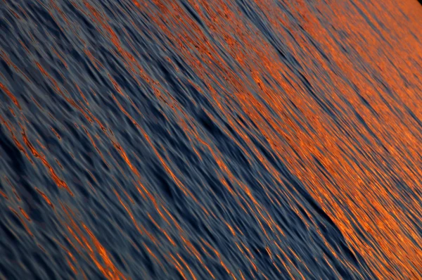 Water ripples, sea sunset background — Stock Photo, Image