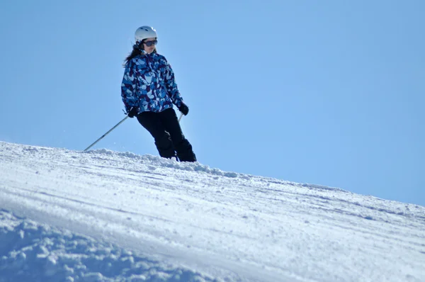 Skier skiing down on the piste — Stock Photo, Image