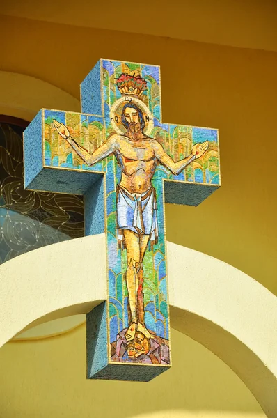 Jesus on cross, mosaic in a Greek Catholic church — Stock Photo, Image