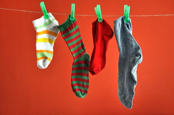 Socks hanging on a rope — Stock Photo, Image