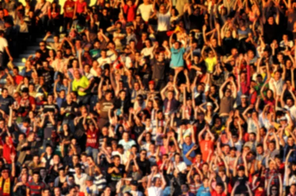 Multidão turva de pessoas em um estádio Fotografia De Stock