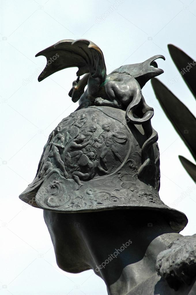 Small dragon on a helmet. Detail on a public statue in Arad, Rom