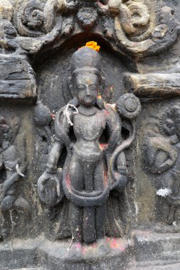 Buda Swayambhunath içinde oturan eski heykelciği. Şimdi destro