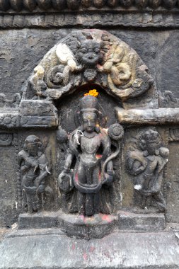 Buda Swayambhunath içinde oturan eski heykelciği. Şimdi destro