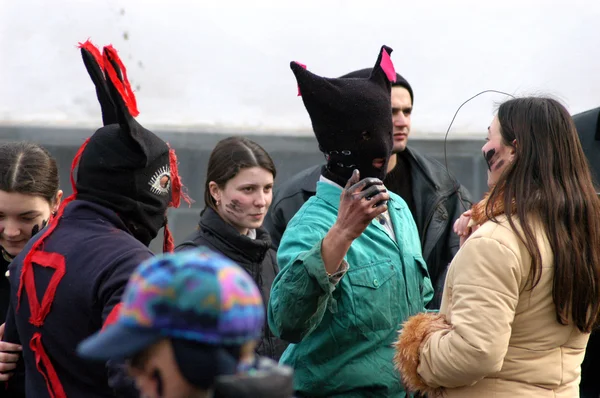 People in traditional costumes celebrating the winter carnival — Stock Photo, Image