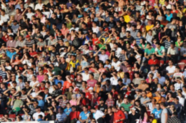 Crowd of people at a soccer match — Stock Photo, Image