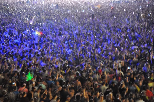 Crowd of blurred people — Stock Photo, Image