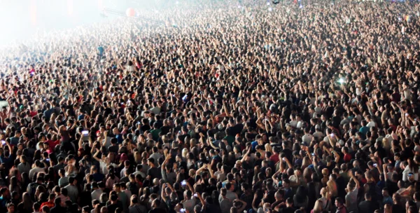 Crowd of blurred people — Stock Photo, Image