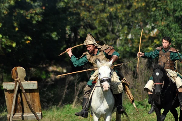 Equestrian demonstration in traditional costumes — Stock Photo, Image