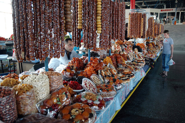 Dried fruits, sweets, pickled vegetables and spices in the bazaar