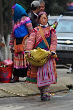 Vietnamese people wearing traditional costume in Bac Ha market, clipart
