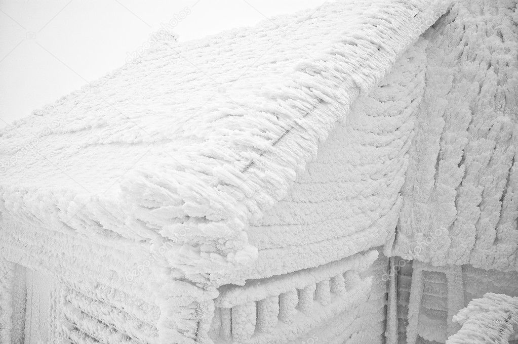 Snow covered house after blizzard
