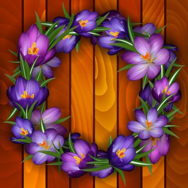 Ahşap arka plan üzerinde Çiğdem çelenk