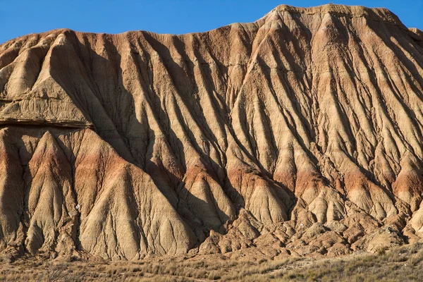 Зруйнованою глинистих утворень у bardenas будівля — стокове фото