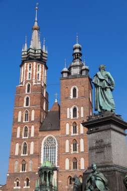St Mary Church and Adam Mickiewicz Monument clipart