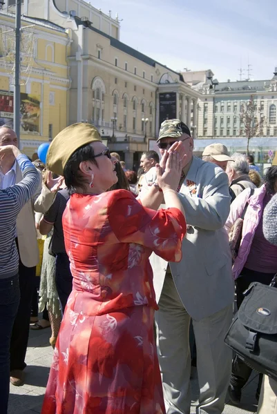 People dance on Theater Square in Moscow.