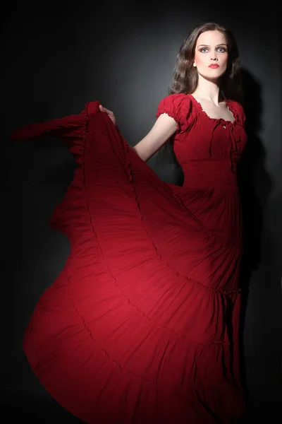 Elegant woman in red dress Fashion model — Stock Photo, Image