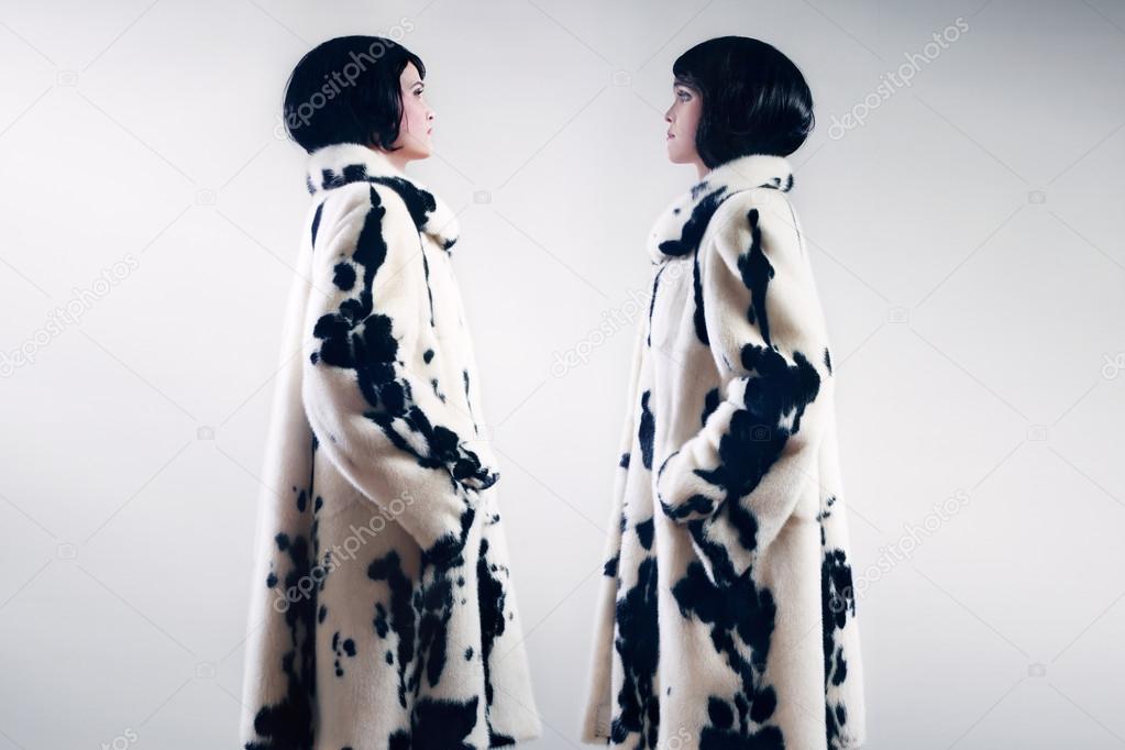 Fur coat winter clothes fashion. Black and white mink