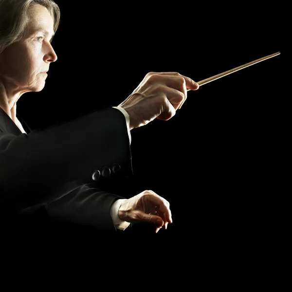 Orchestra conductor hands baton — Stock Photo © alenavlad 28330545